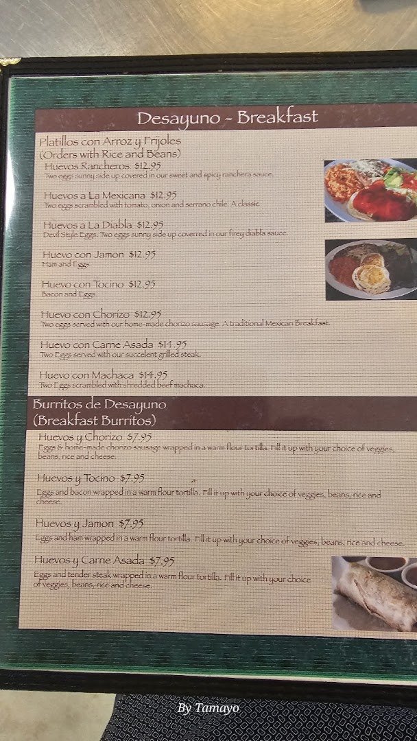 Simple plated entrees in a busy Mexican restaurant.